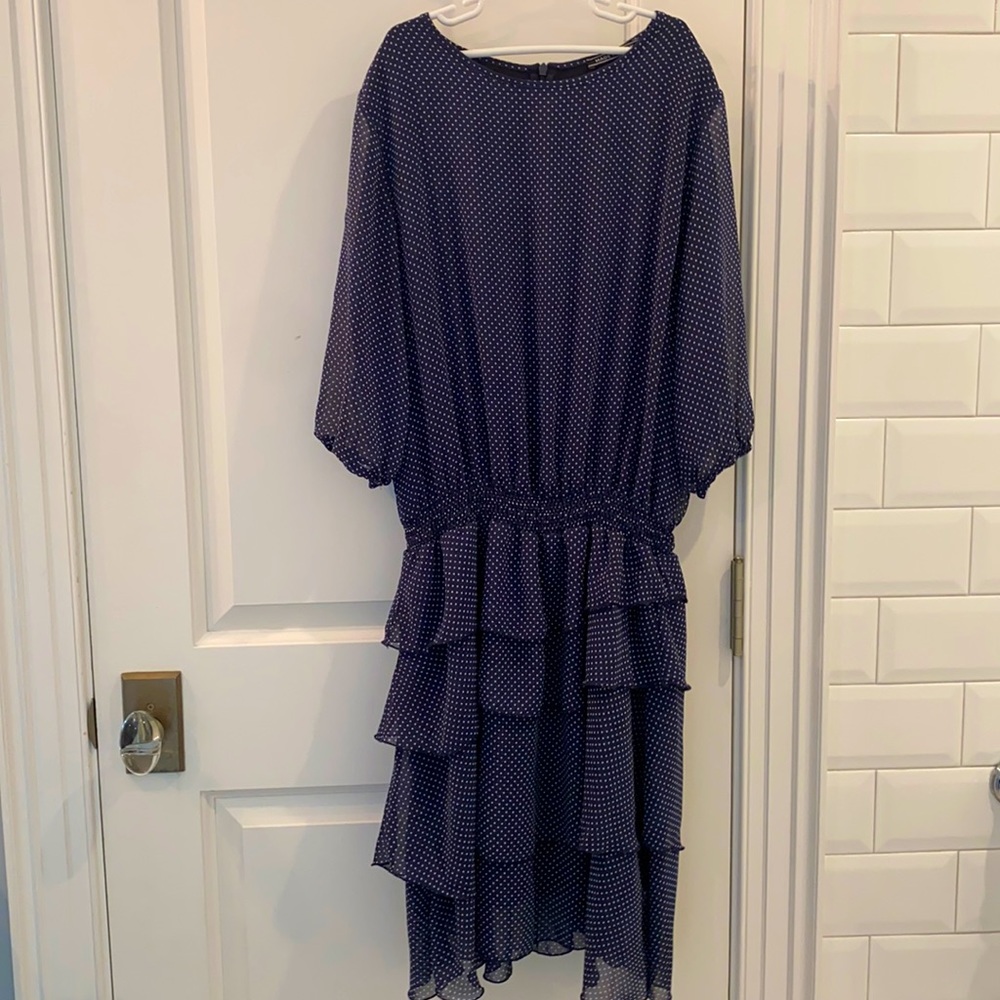 Ruffle blue and white polka dot dress. Knee length and elbow length